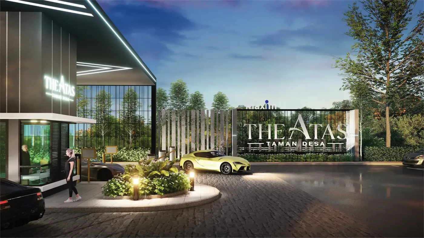 Arrival gate and drop-off at The Atas with the project signage lit at dusk